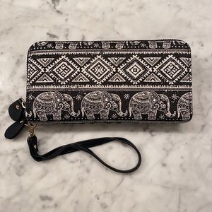 Never worn elephant wallet.